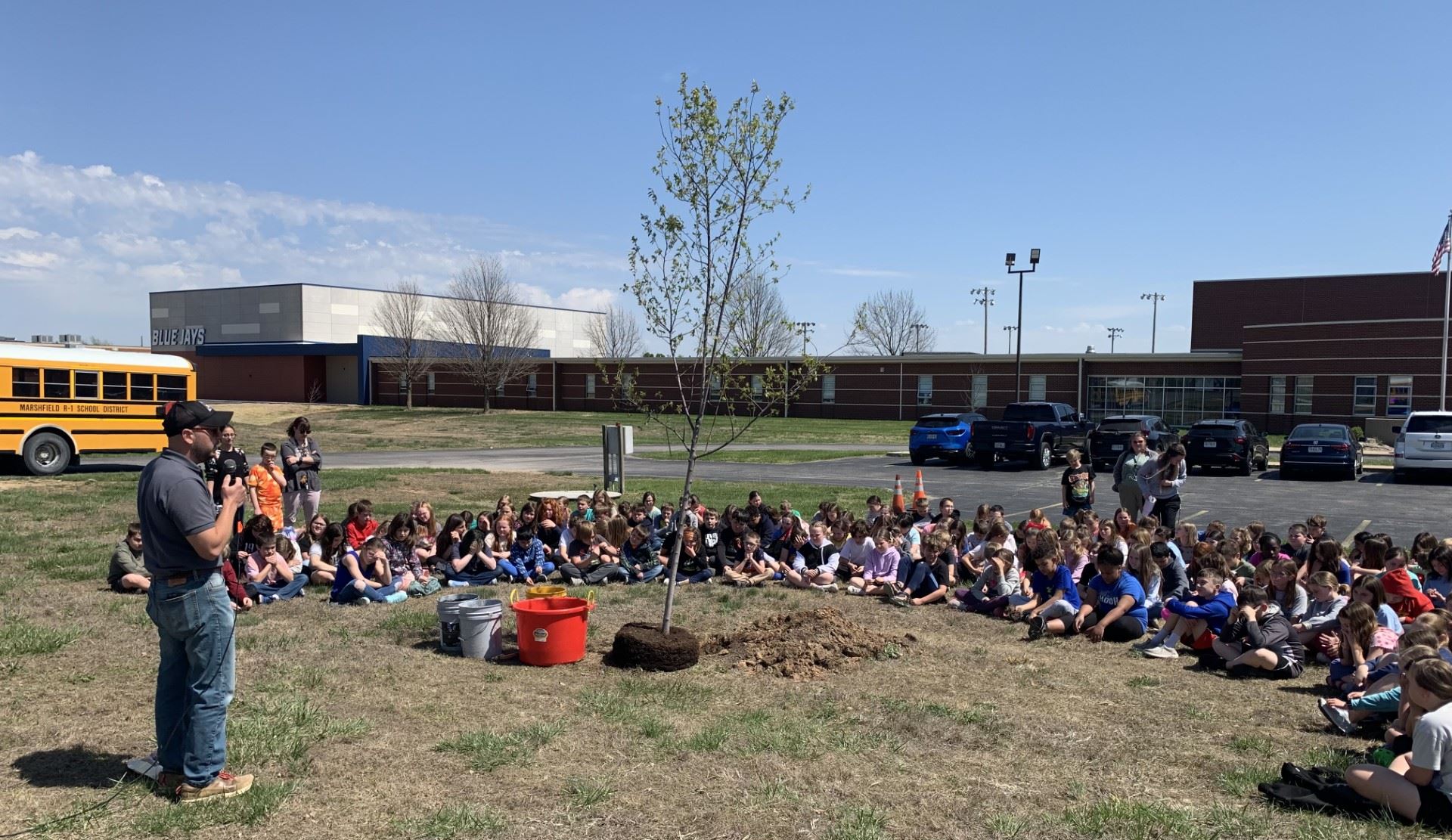 Justin with students